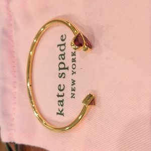 Kate Spade gold and garnet heart bangle